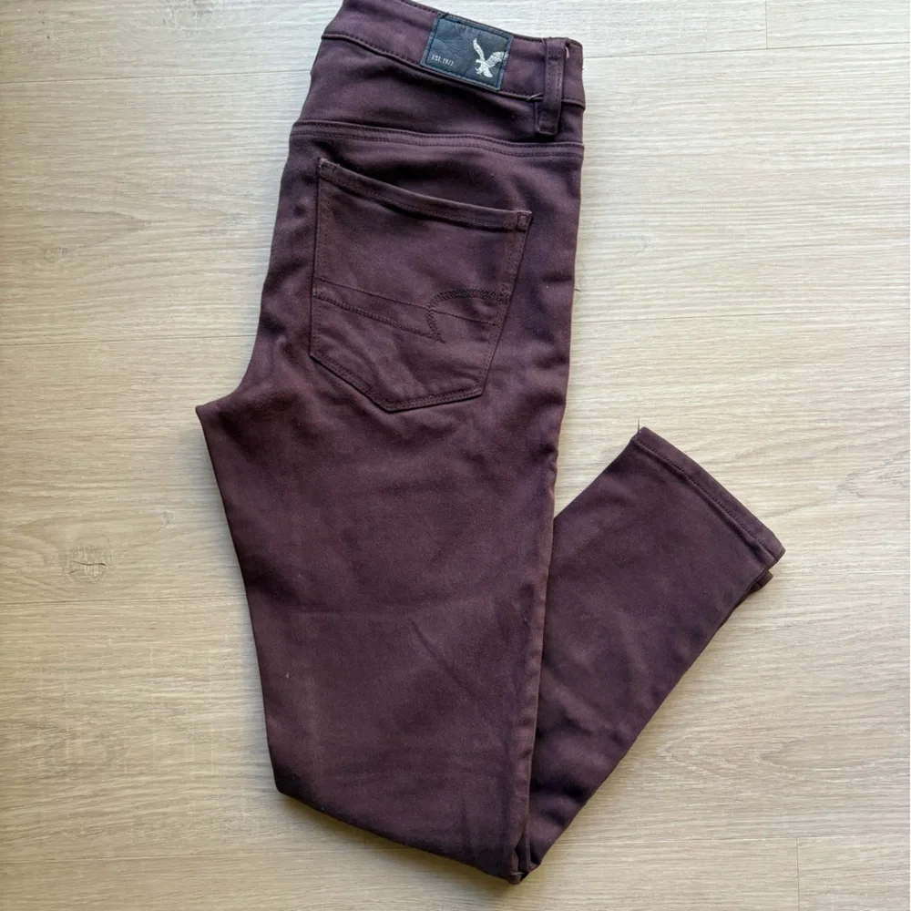 Woman’s American Eagle Outfitters Women's Dark Purple Skinny Jeans